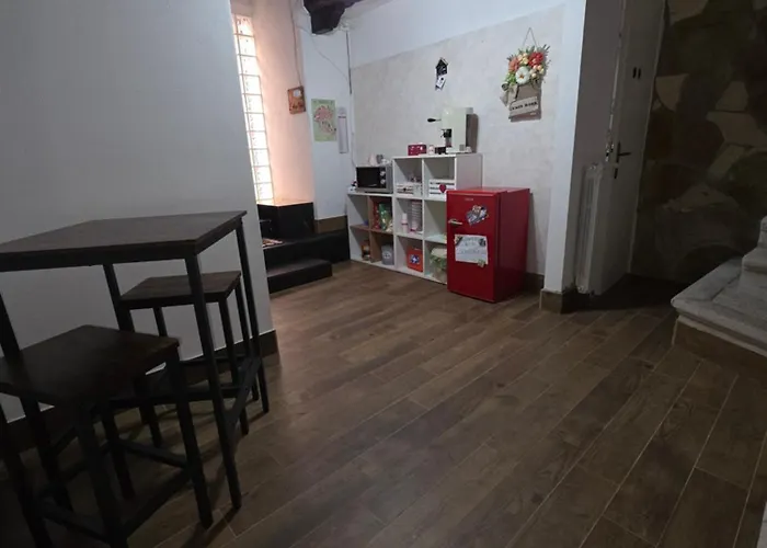 Couette-café L' Arco Rosa